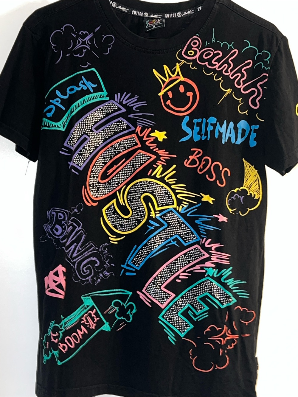 Hustler Hollywood Black Tee with Neon Multicolor Graffiti ‘HUSTLE’